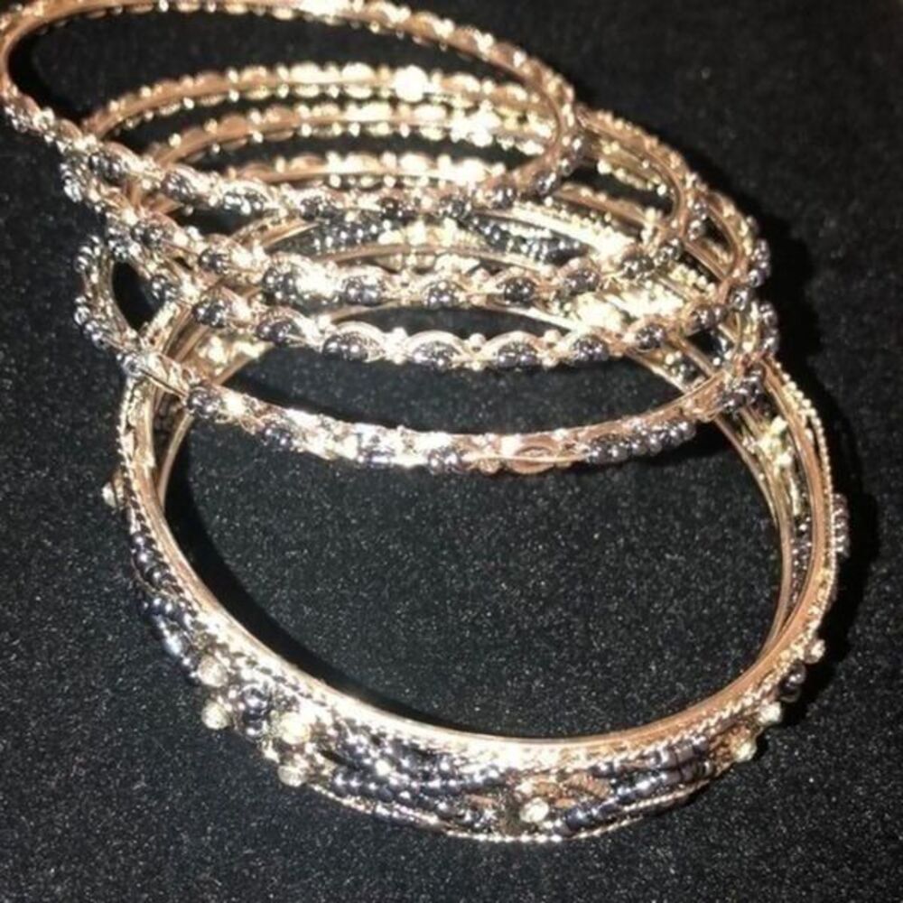 Bangle silver tone beaded and mini  glass stones  bracelet and intricately made.
